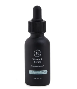 A black dropper bottle of Skin Laundry Vitamin A Serum, highlighting "1.0% RETINOL COMPLEX 1.0% ENDIMOIST® 4HA" on its label, against a white background.