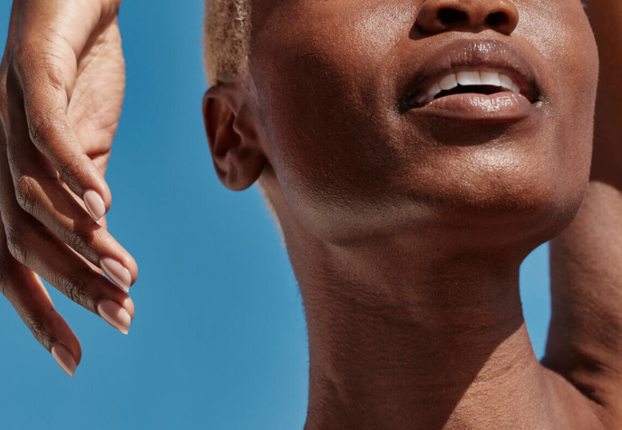 Close-up of woman with smooth, radiant skin under natural light after Skin Laundry UAE laser facial